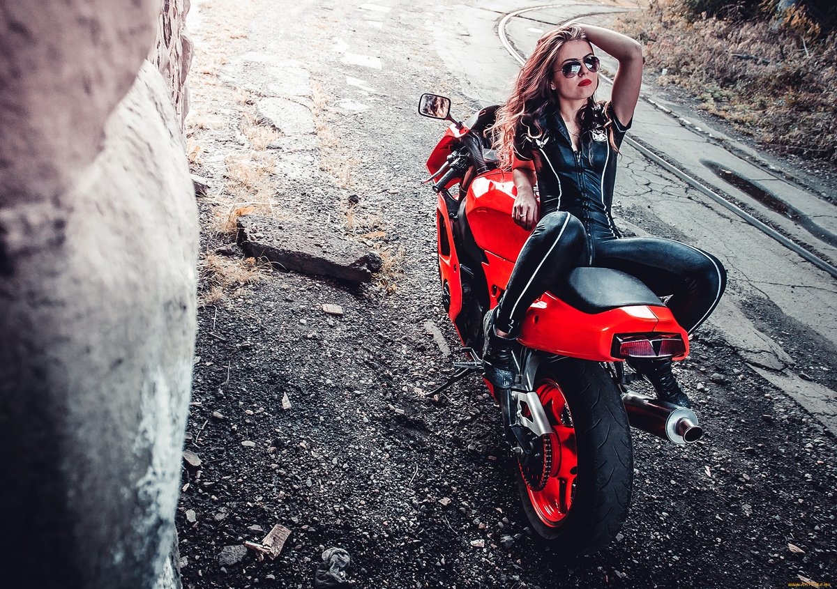 Blondes on a motorcycle in Porto Novo