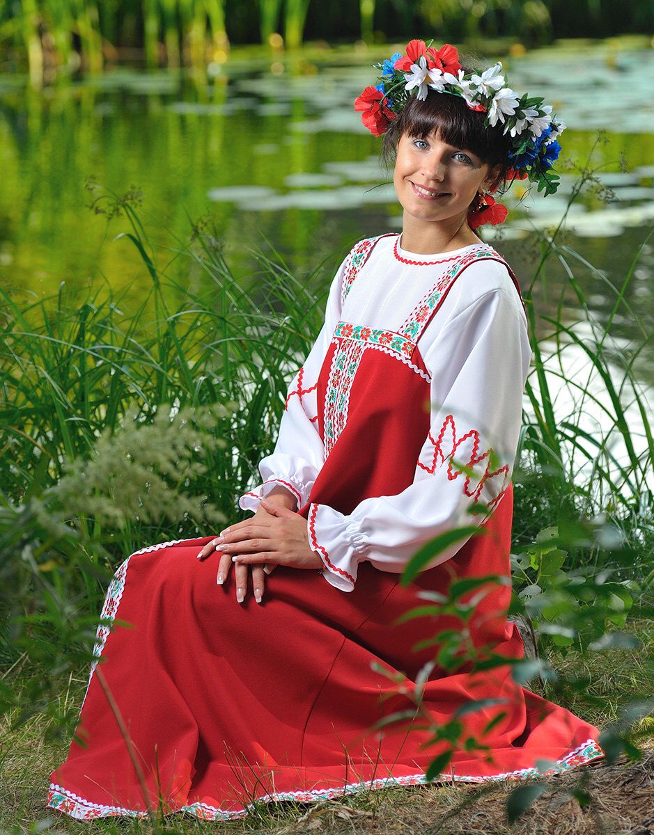 Beautiful girl Girls in Slavic costumes in Porto Novo
